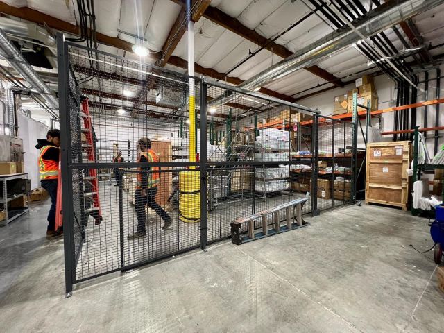 One of our crews is up in NorCal finishing up the installation of this @wirecrafters 3-Sided Wire Cage. This security cage measures 8'5-1/4” H with the sides measuring (1) 26' L, (1) 32' L & (1) 22' L.

The Cage features a 48" W X 7'H Swing Door and a 6' Sliding Gate with Lock for added security.
 
Security cages to be designed and built with custom sizes and configurations to meet your unique specifications. 

If you need to protect inventory or need limit access to tools and equipment, contact our Sales Team today for more information.

#warehousesecurity #wirecage #securitycage #warehousing #securedstorage